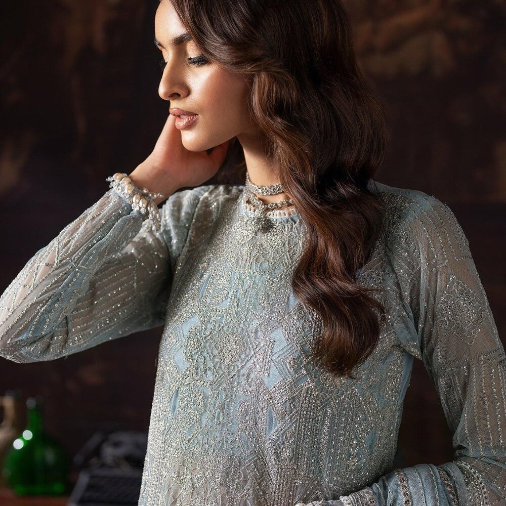 Brand new. Ice Blue with hand stitched Sequins and embroidery Indian Suit